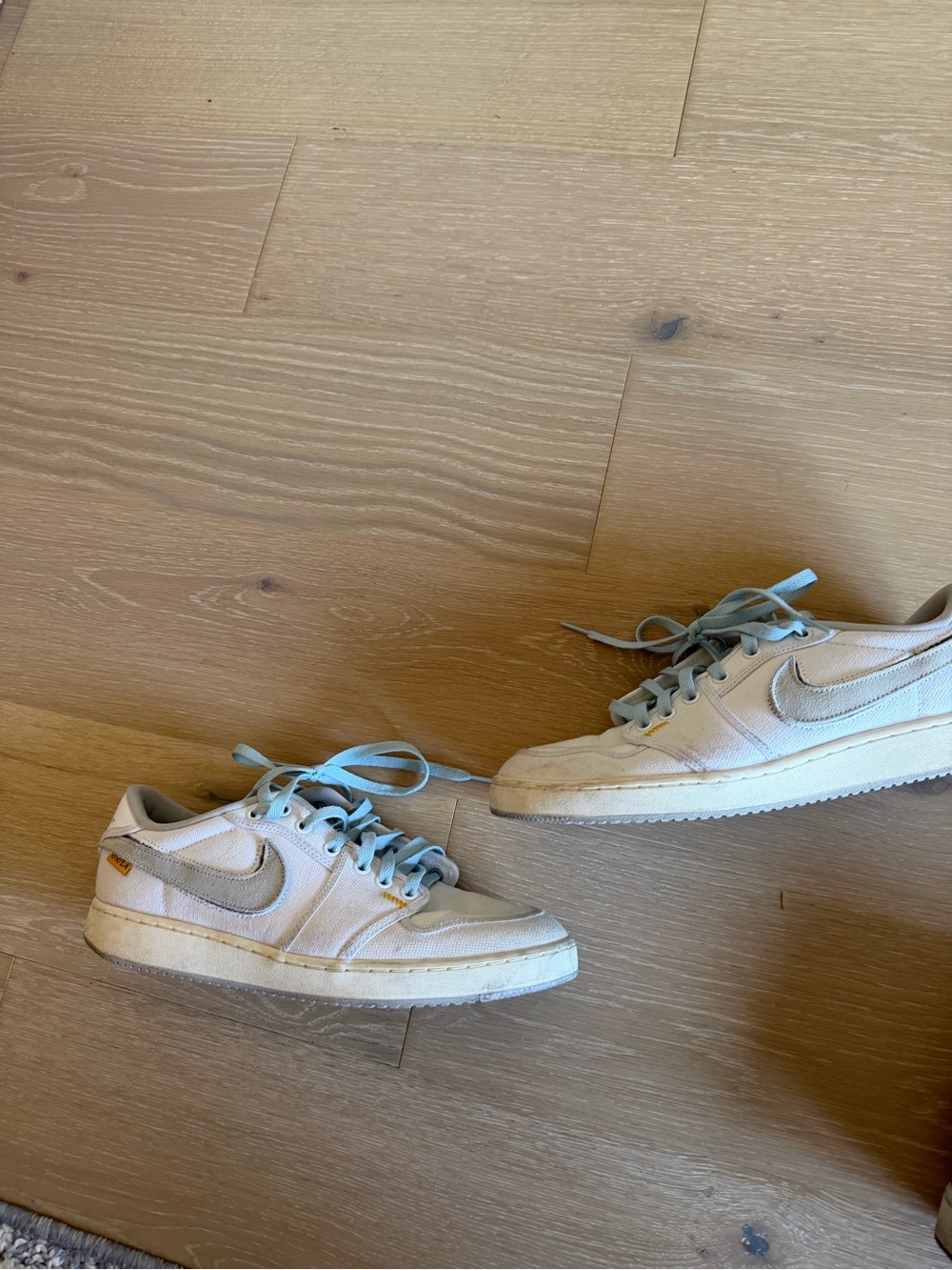 Jordan 1 Low Union LA Low-Top Sneakers in Light Beige with Blue Laces